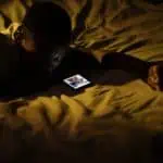 sleepless using his mobile phone and getting more screen time