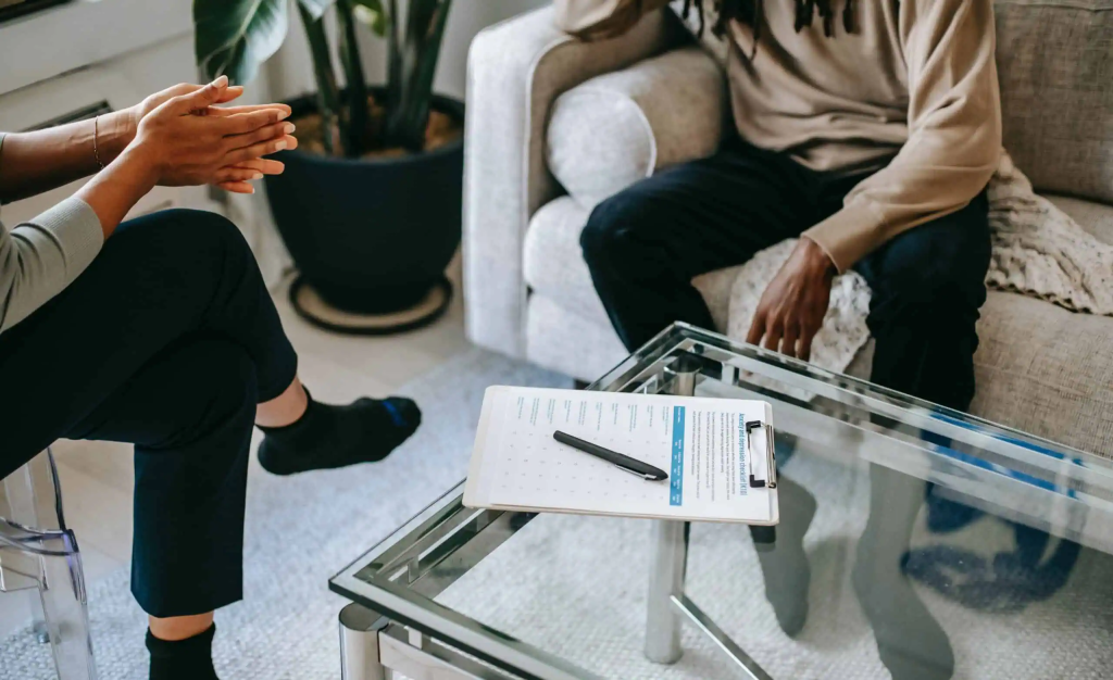 Counseling session at Davenport Psychology clinic with a therapist and a patient discussing mental health and emotional well-being.