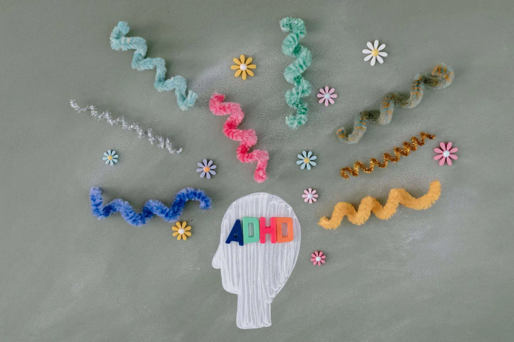 A conceptual image of a head with ADHD, showing a mix of colorful, creative, and chaotic thoughts, representing ADHD assessment in Sarasota, FL.