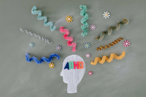 A conceptual image of a head with ADHD, showing a mix of colorful, creative, and chaotic thoughts, representing ADHD assessment in Sarasota, FL.