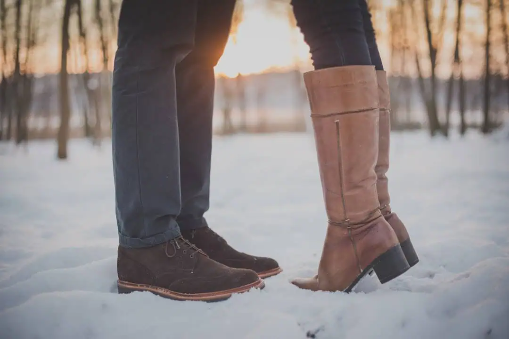 Comfortable winter boots on a snowy landscape, symbolizing warmth and resilience in cold weather. Perfect for outdoor winter activities and appreciating nature's beauty during the winter season.