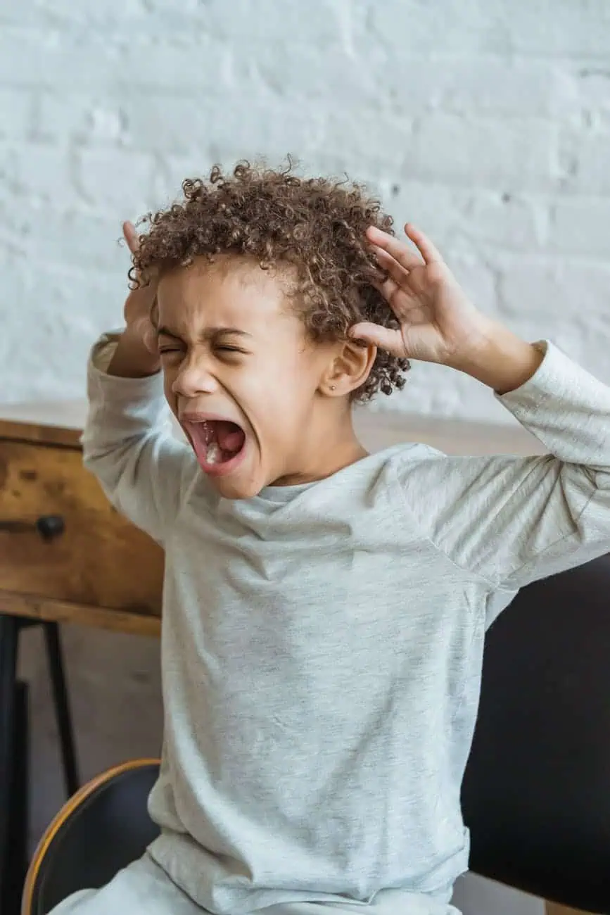 desperate screaming young boy