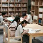 students studying in a library setting