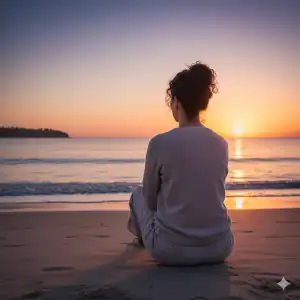 A person sits calmly on a tranquil Sarasota beach at sunrise, looking towards a clear horizon, symbolizing hope and expert psychological support for life transitions in Venice, FL.