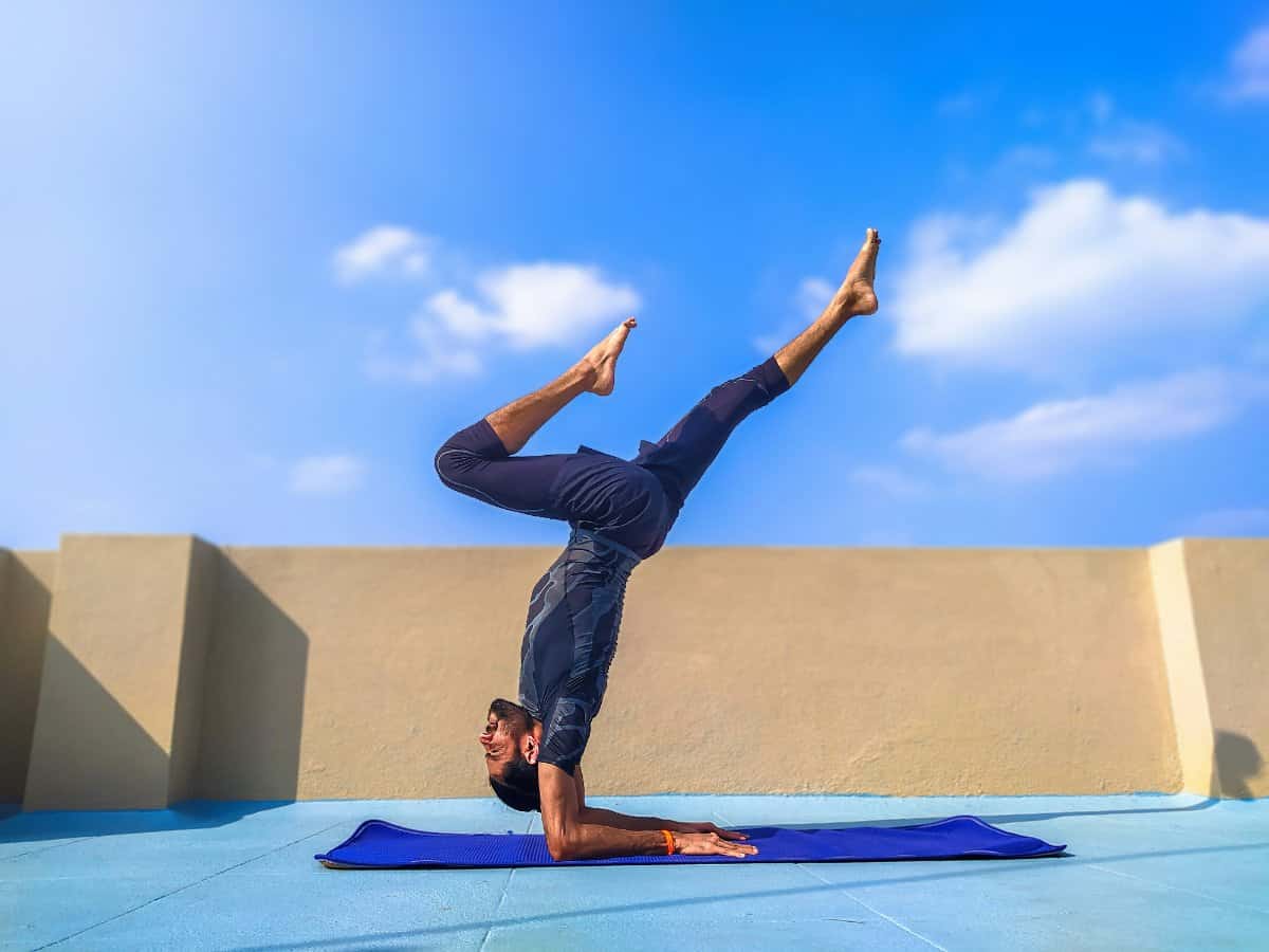 Person practicing yoga