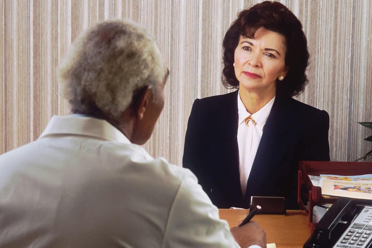 Person consulting a psychotherapist in an office