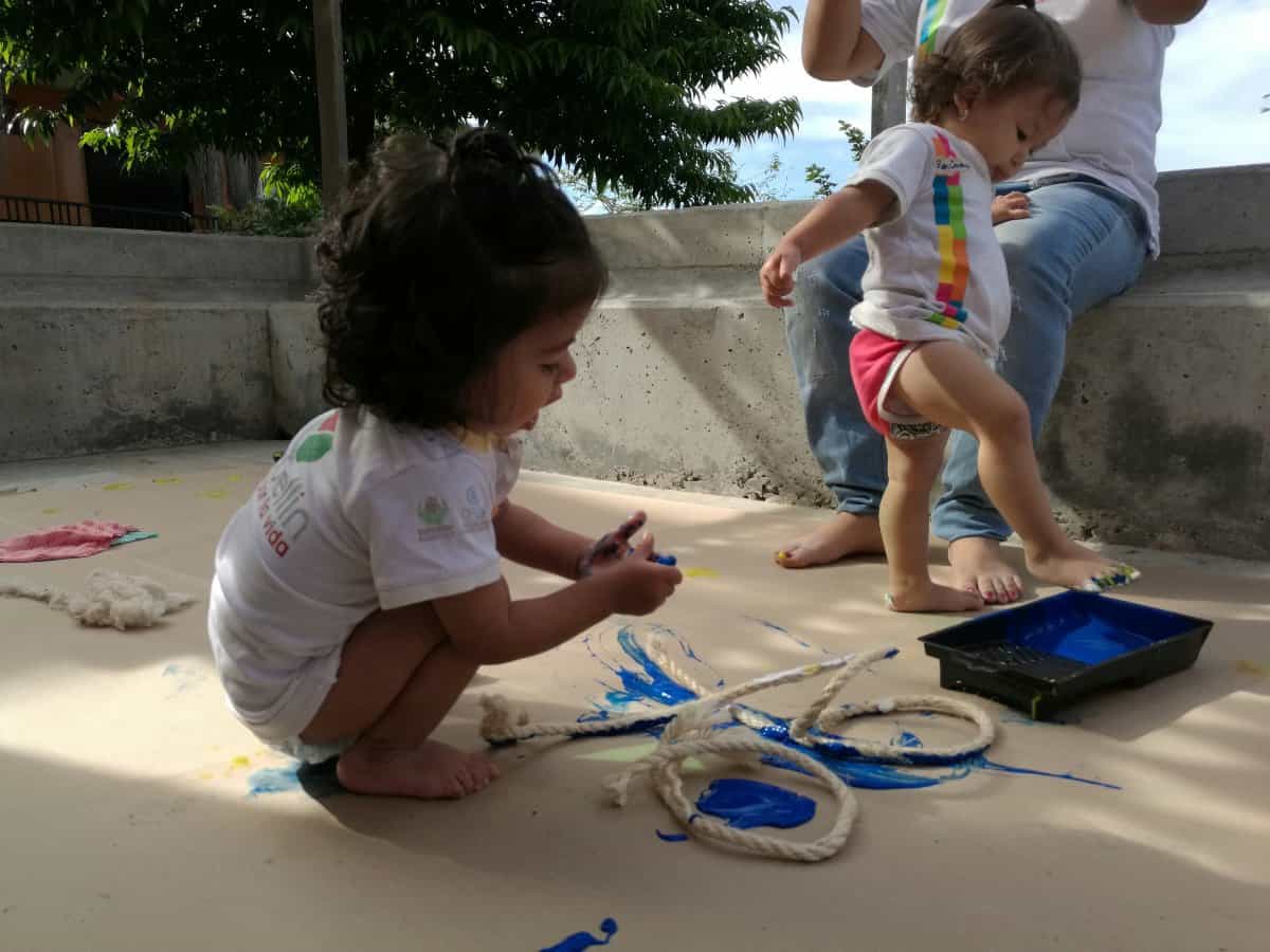 Parent and child enjoying a creative play session