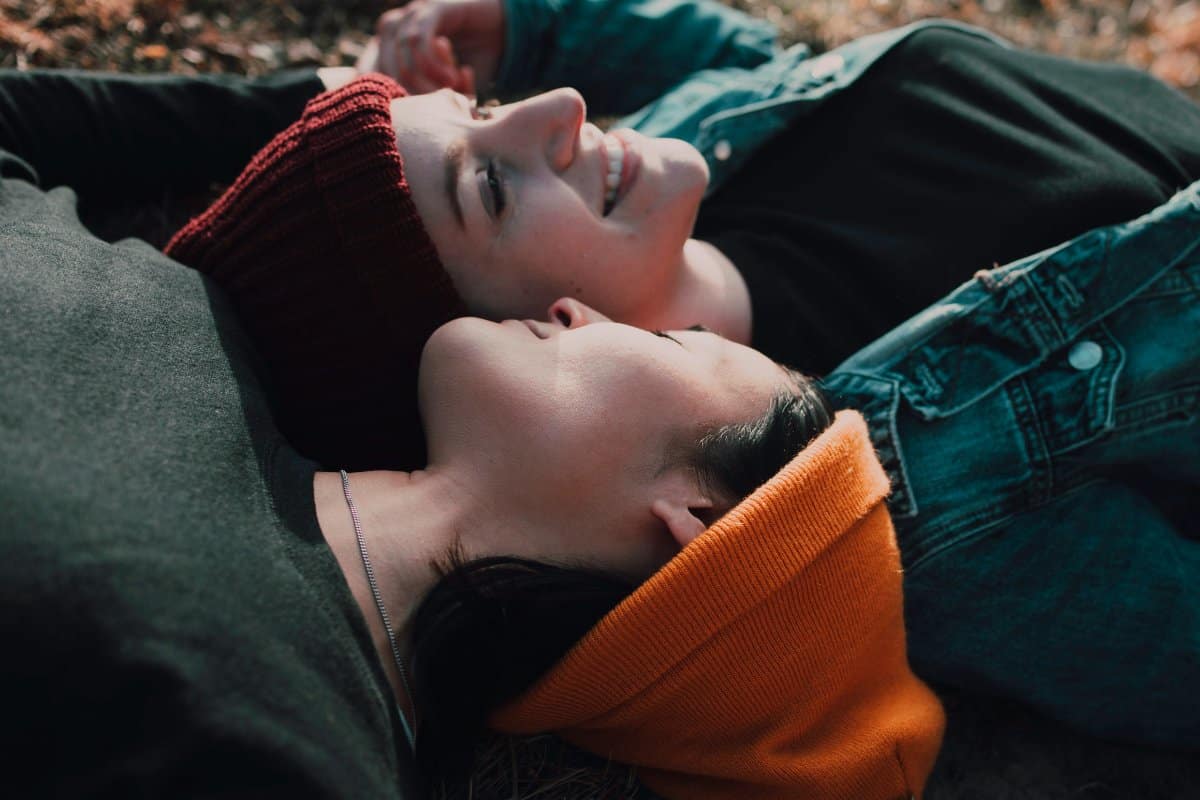 A couple smiling at each other, deeply connected