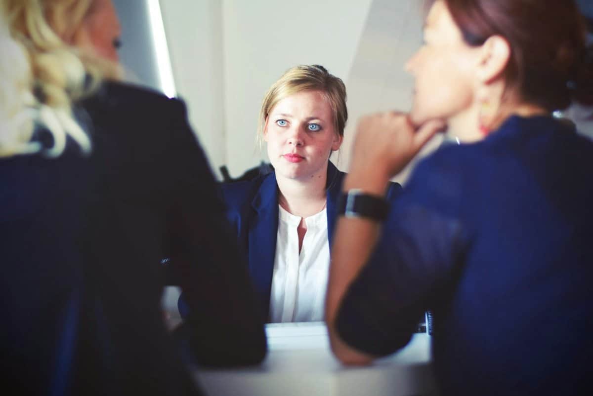 Parents participating in a support group meeting