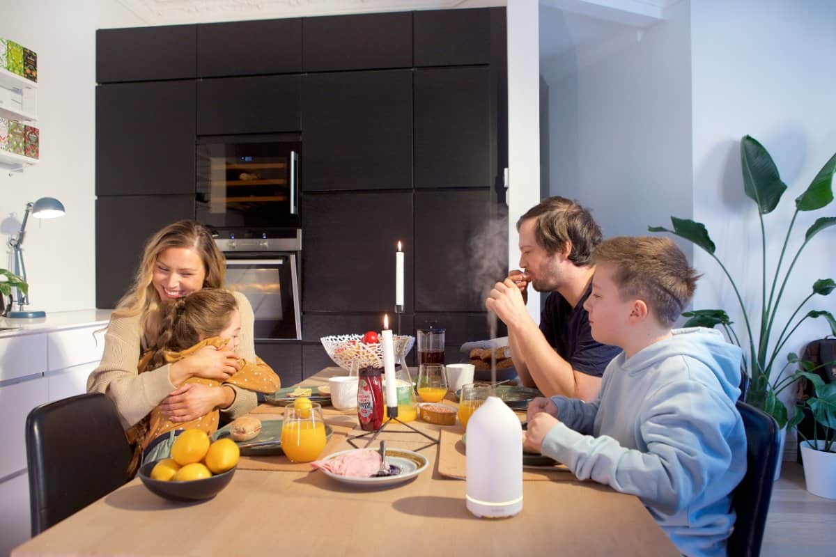 A family using digital devices together, illustrating the balance of technology and family time