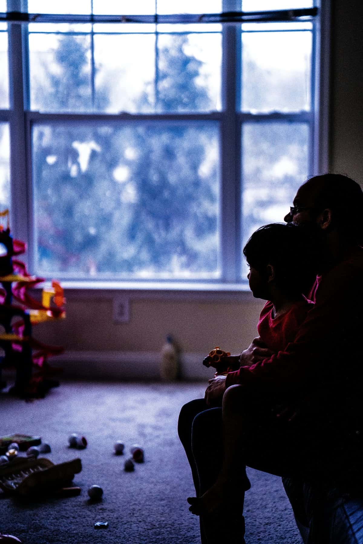 Parent engaging with their child while setting gaming boundaries
