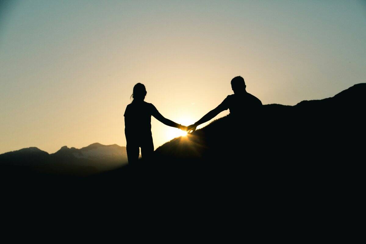 Two partners working together to achieve long-term relationship success