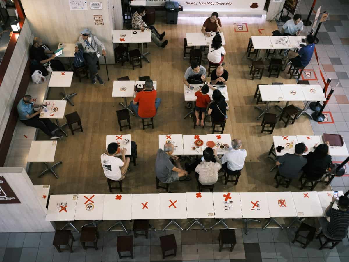 Parents, educators, and mental health professionals collaborating at a table