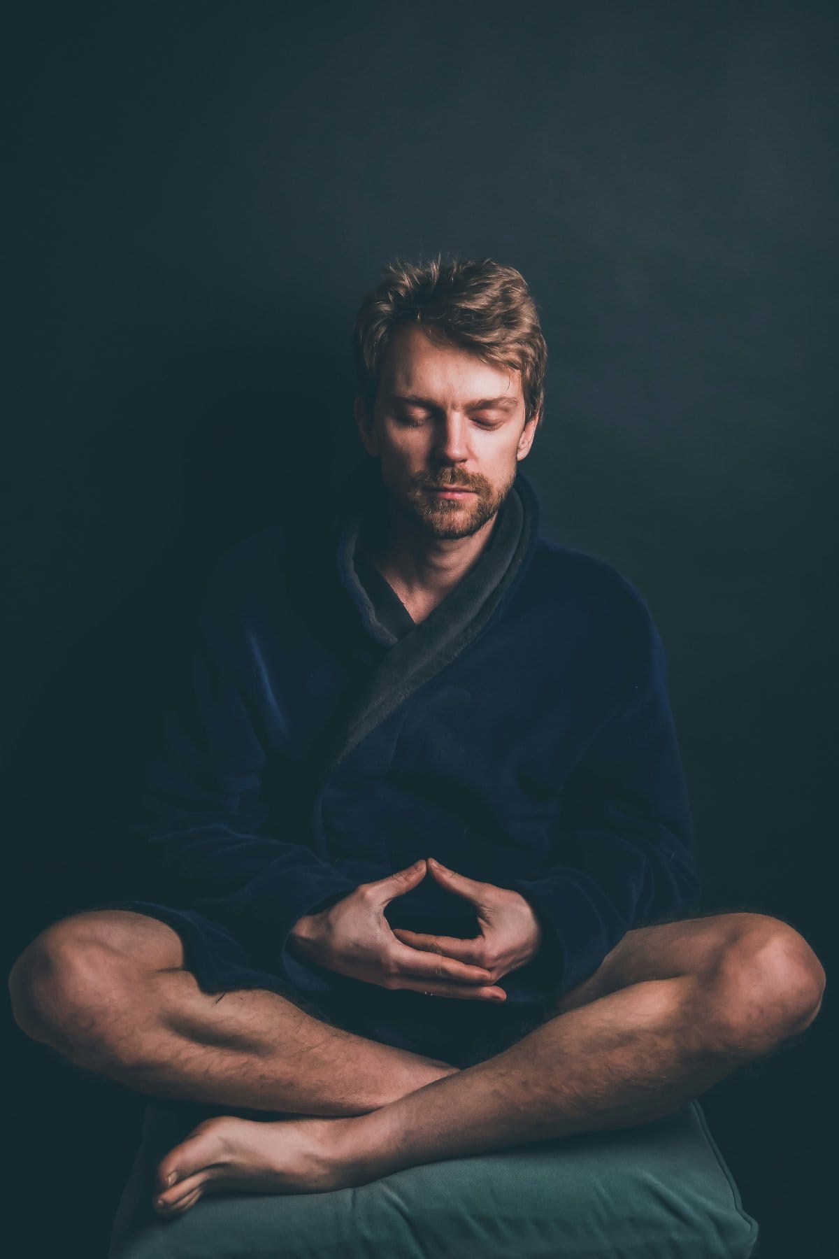 Father engaging in meditation, illustrating self-care